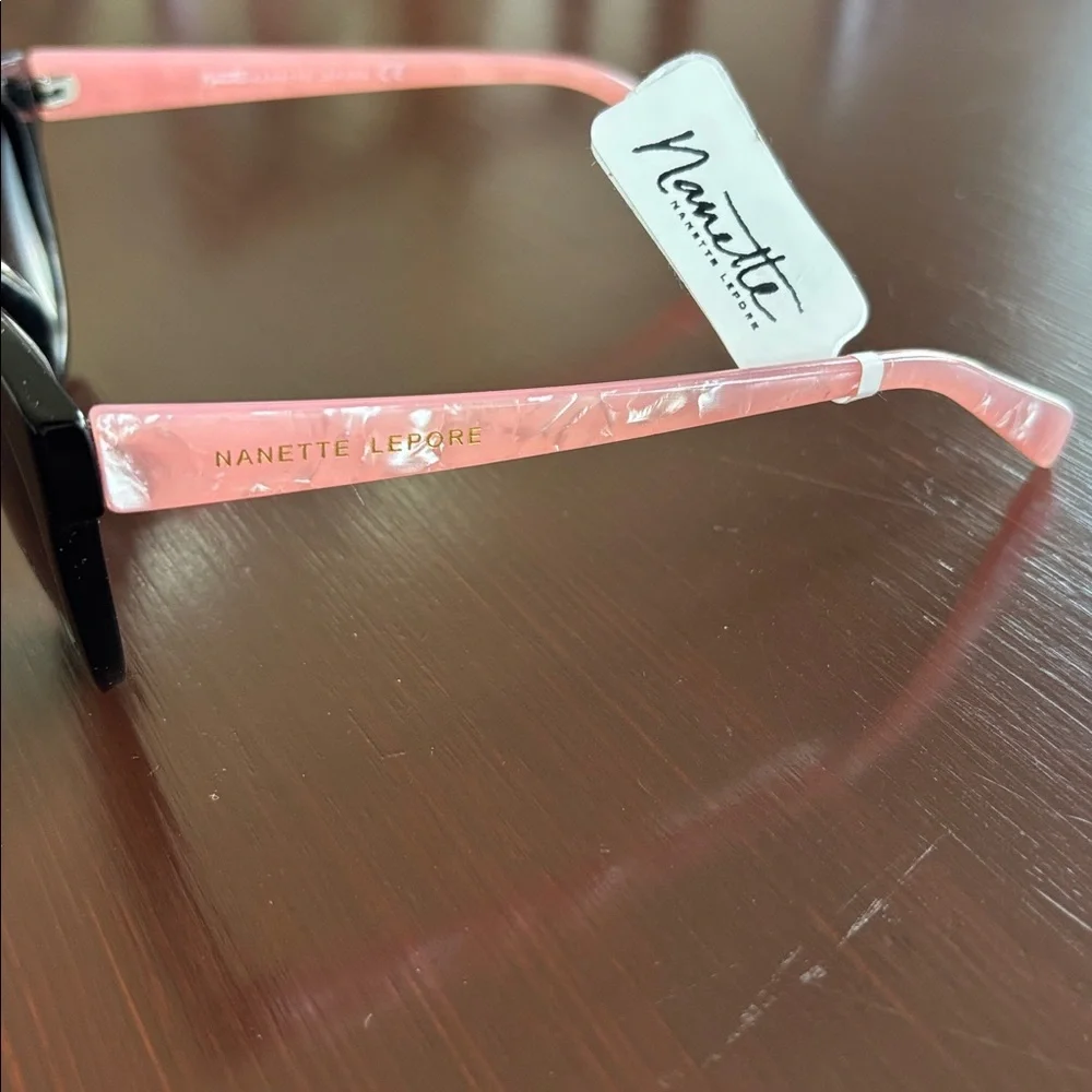 Nanette Lepore 100% UV protection,pearl pink arms,black round/square frame,NN157
